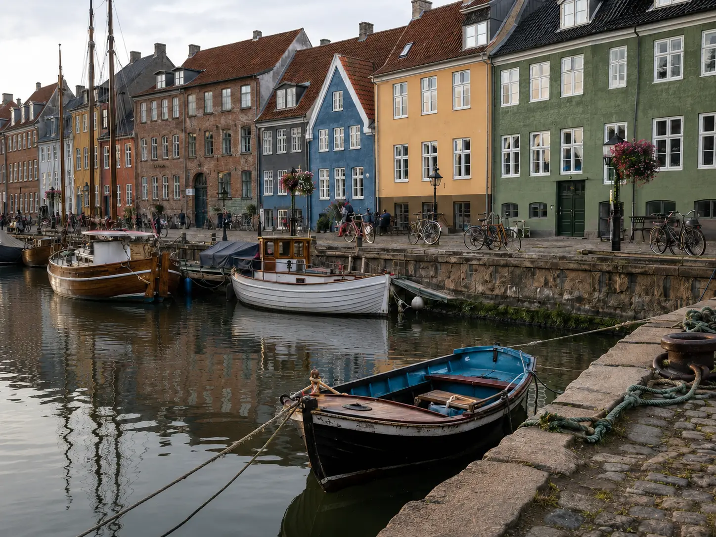 Northern European harbour with colourful facades, boats, bicycles and reflections
